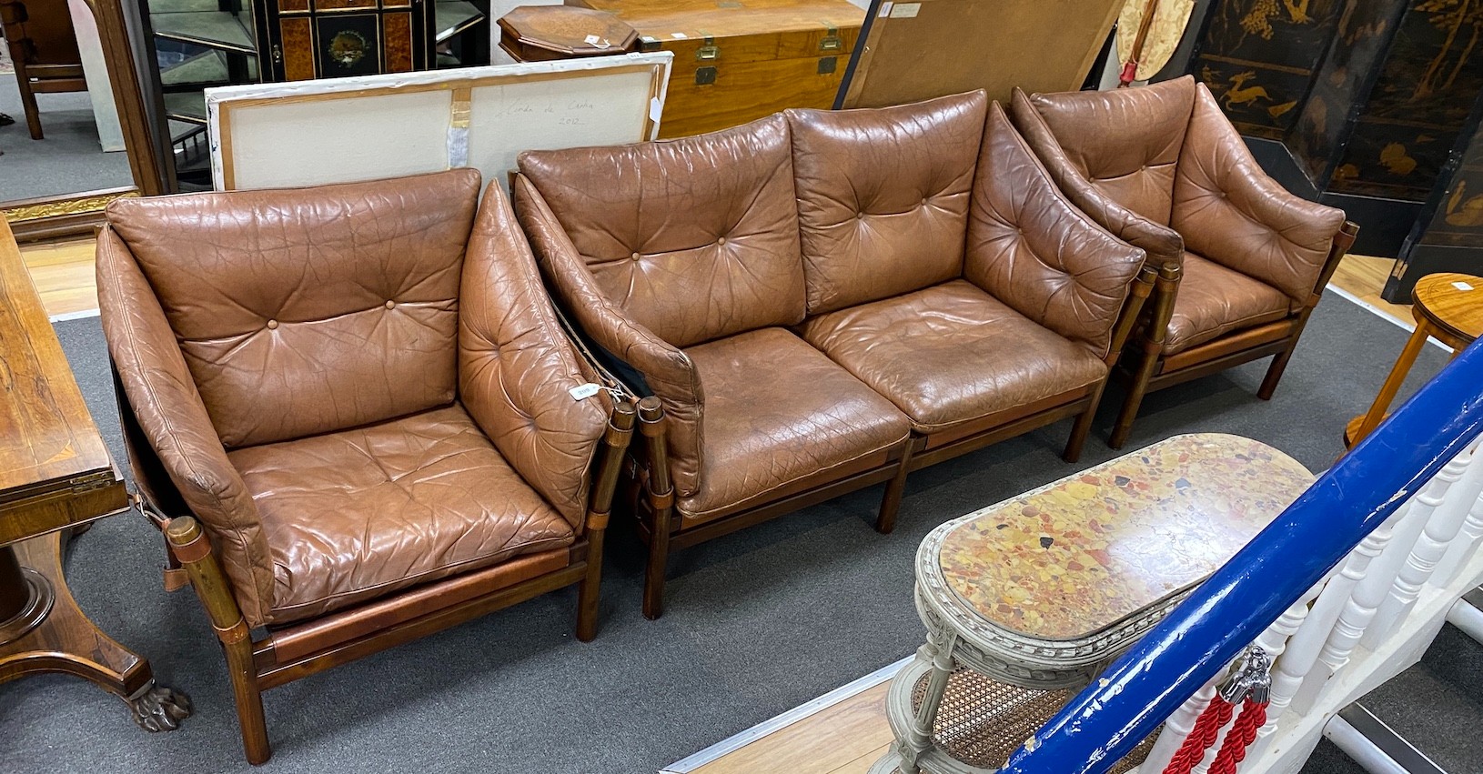 An Arne Norell Ilona settee and two chairs, manufactured by Aneby Mobler in 1960's, settee length 150cm, depth 73cm, height 77cm